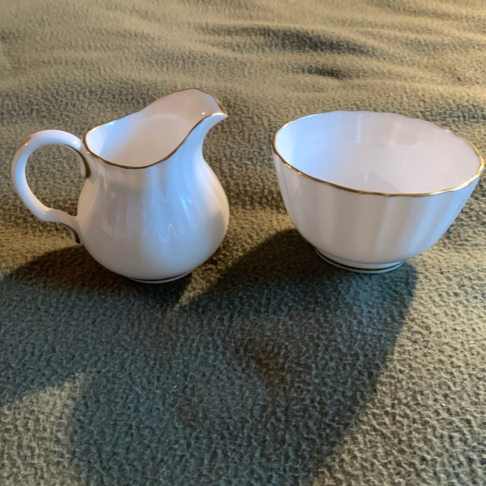 Vintage Royal Worcester china cream and sugar & sugar set.  White w/ gold edges